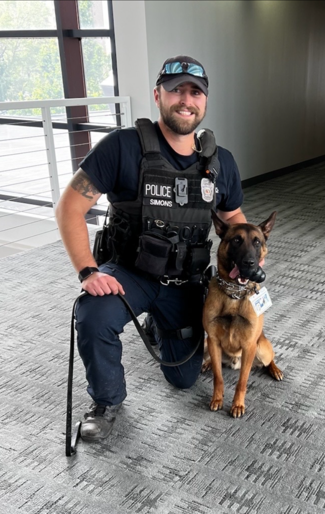 K9 Carlo and his dad, Officer Simons.